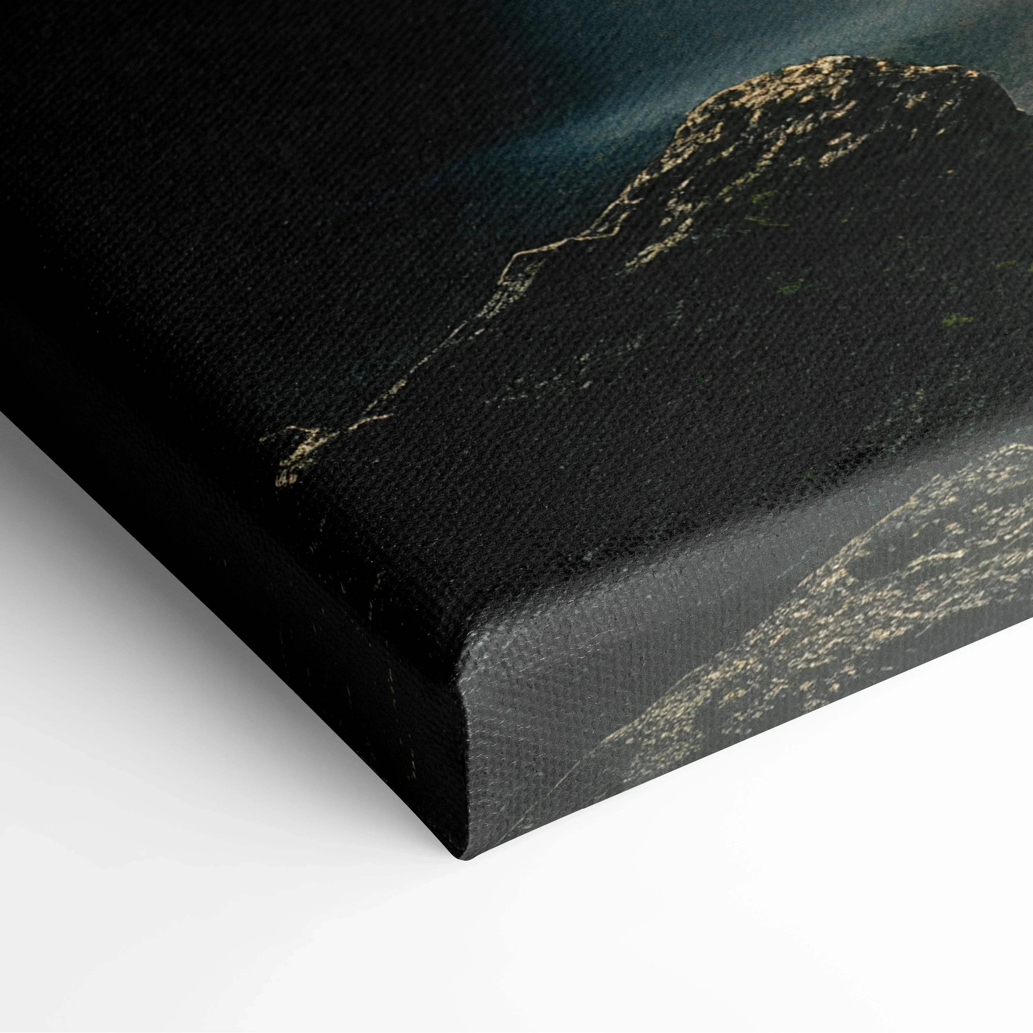 Black canvas print of rugged mountain range with subtle gold highlights under moody sky for nature wall art