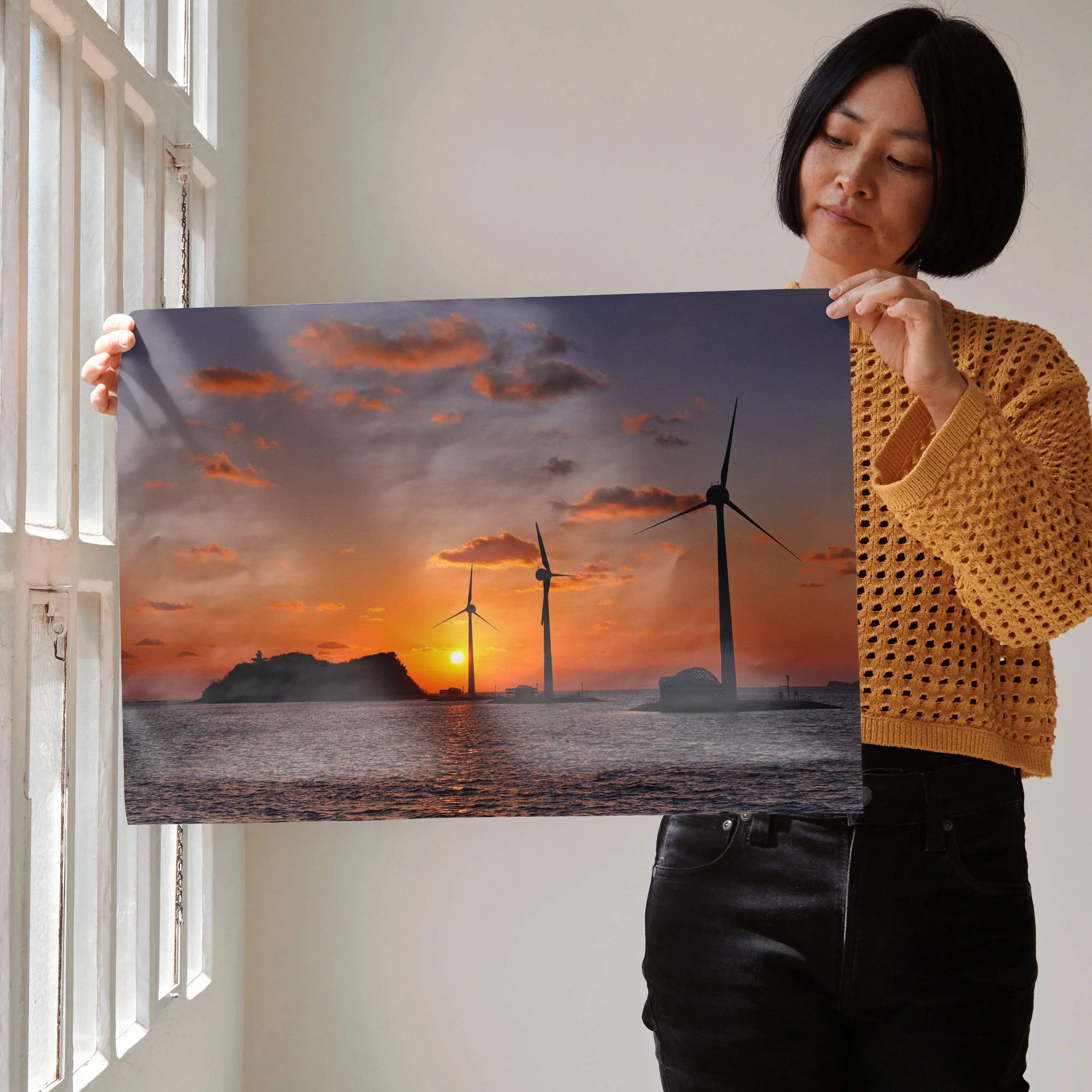 Serene ocean sunset art print featuring a rectangular framed image of wind turbines silhouetted against orange and purple skies