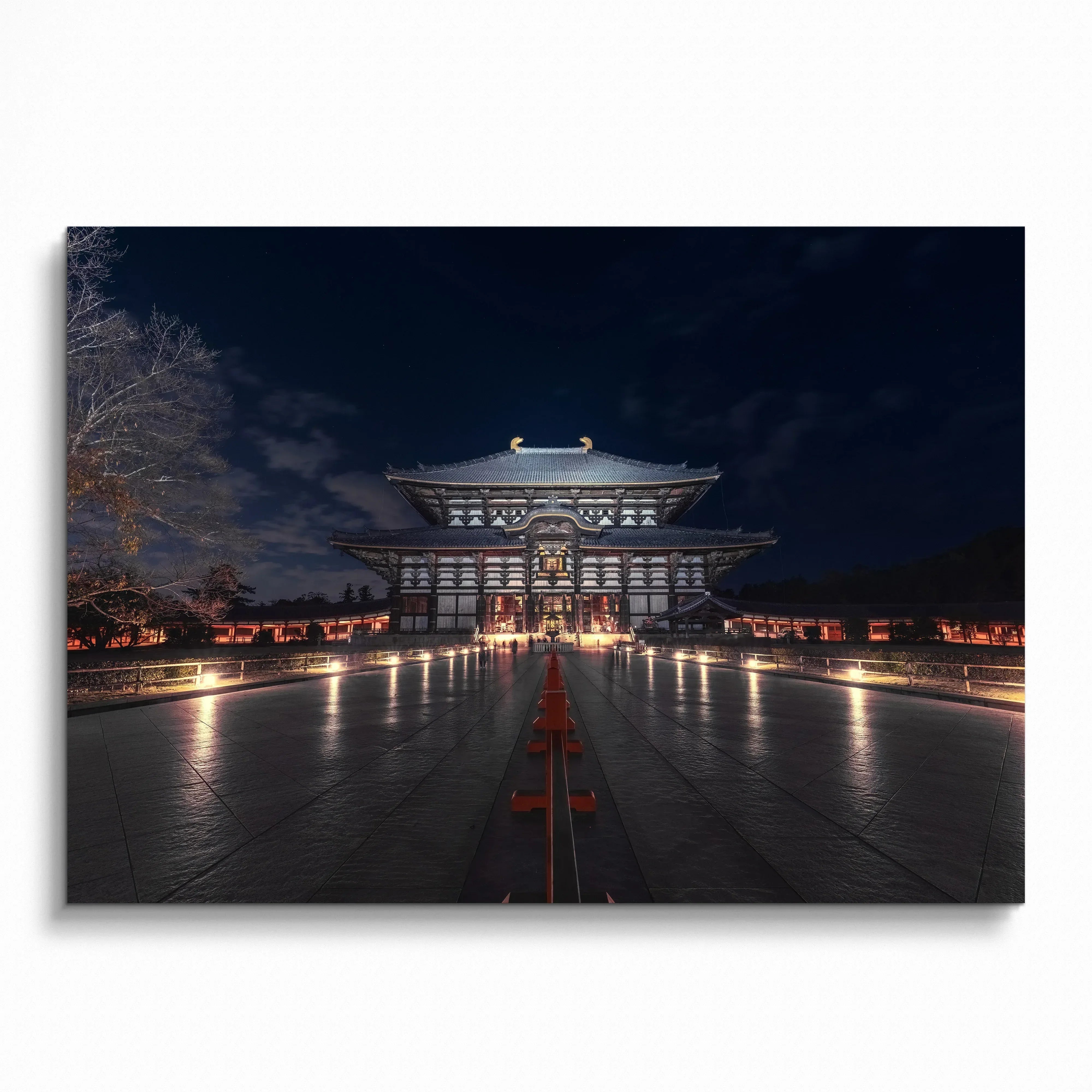 Night city building illuminated with warm lights, featured on art poster for wall decor.