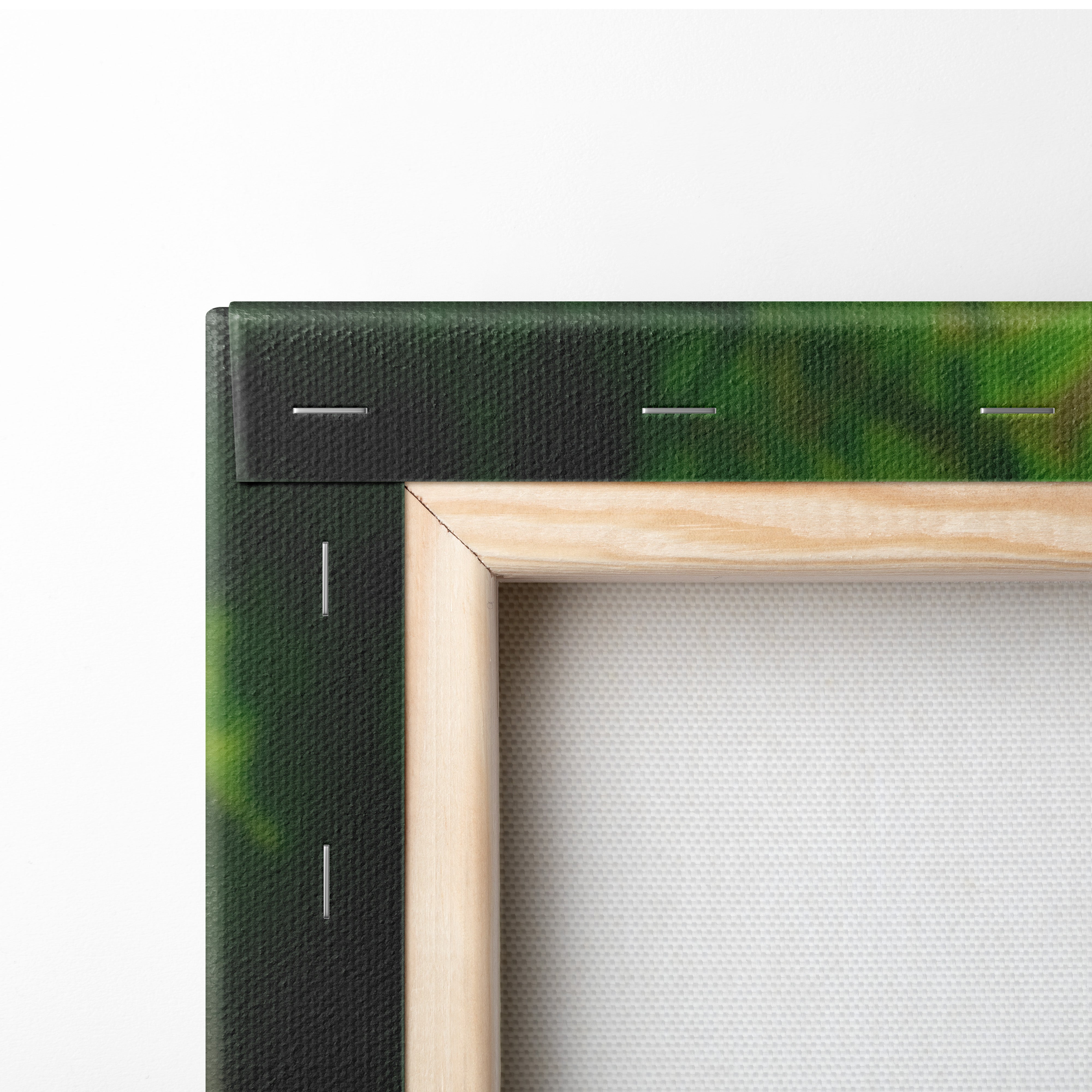 Corner close-up of stretched canvas wall art with wooden frame and black printed edge.