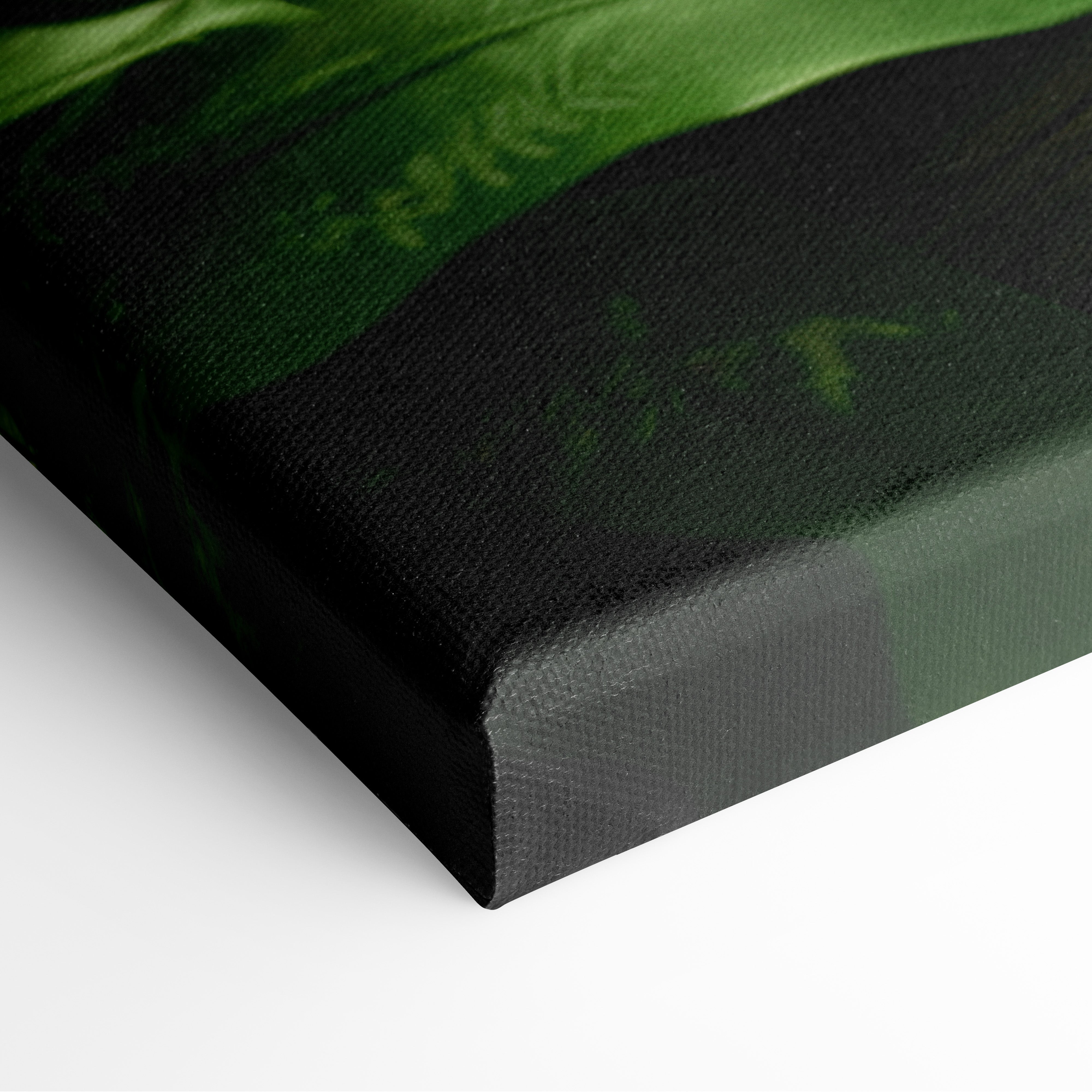 Close-up of canvas wall art corner with dark green and black nature landscape design.
