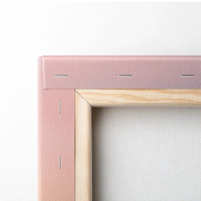 Pink canvas frame with light wood border on stylized winter mountain sunset art