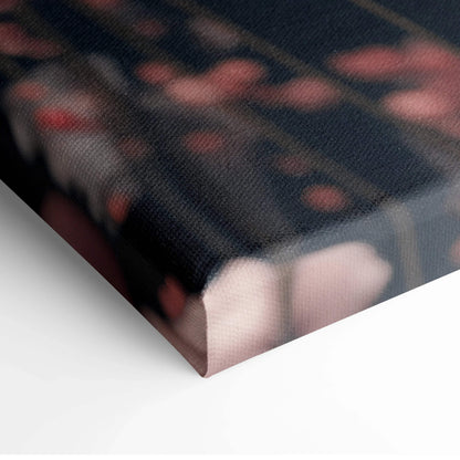 Black canvas print of surreal pink floral blossoms on dark ground