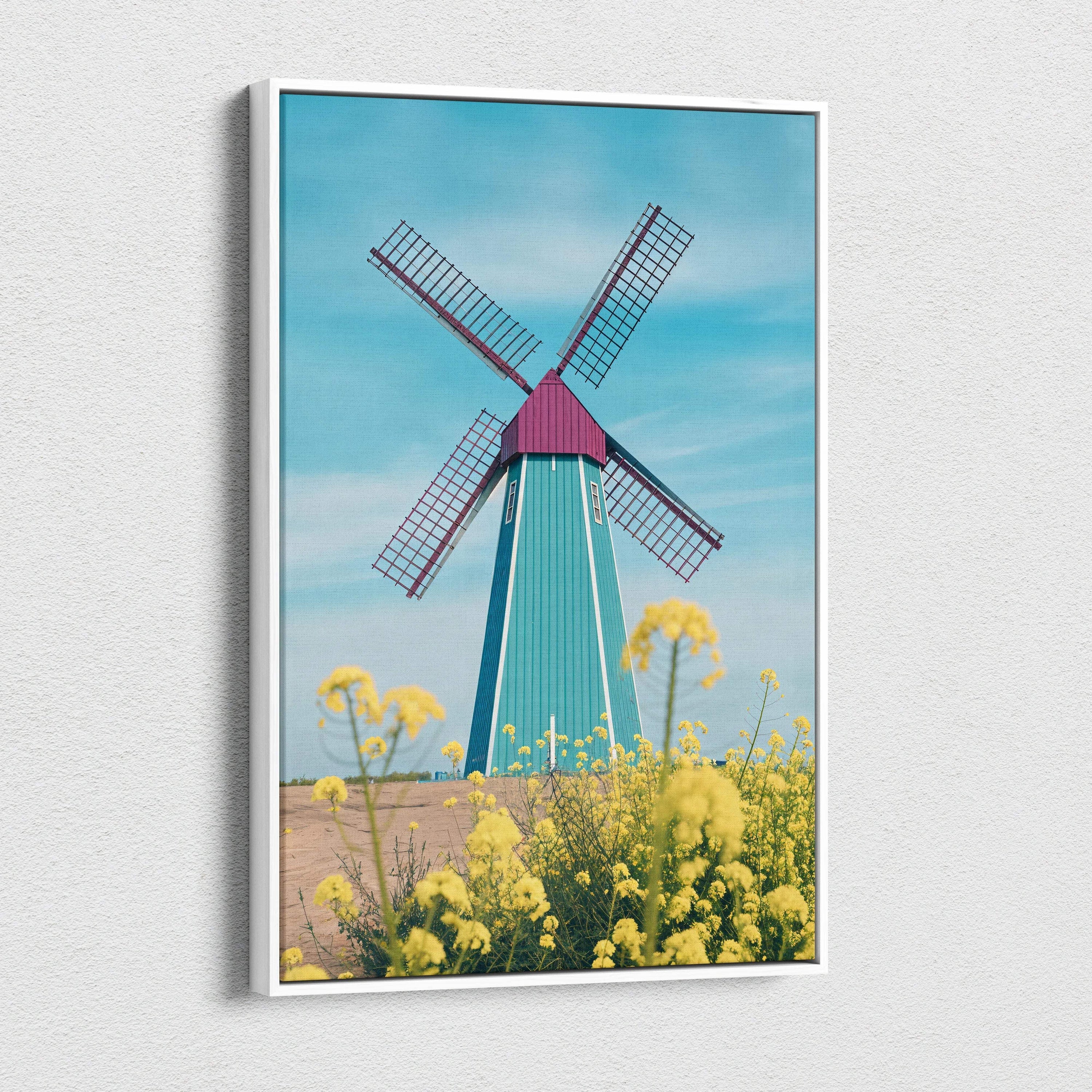 Surreal teal magenta windmill canvas wall art over yellow flowers blue sky