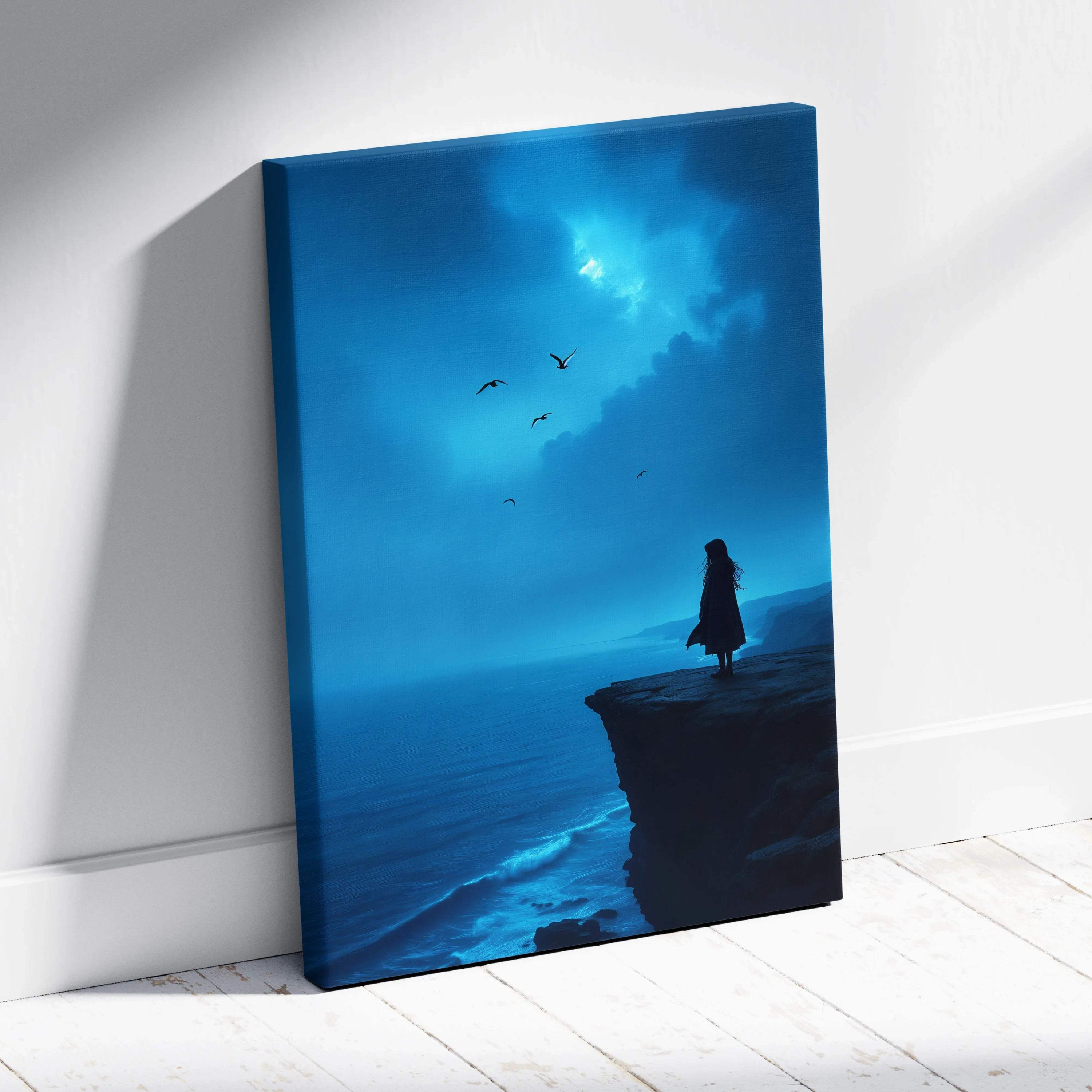 Blue canvas wall art of solitary figure on moody coastal cliff under moonlit sky