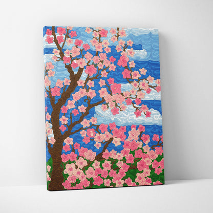 Vibrant cherry blossom tree canvas wall art with pink flowers over blue sky