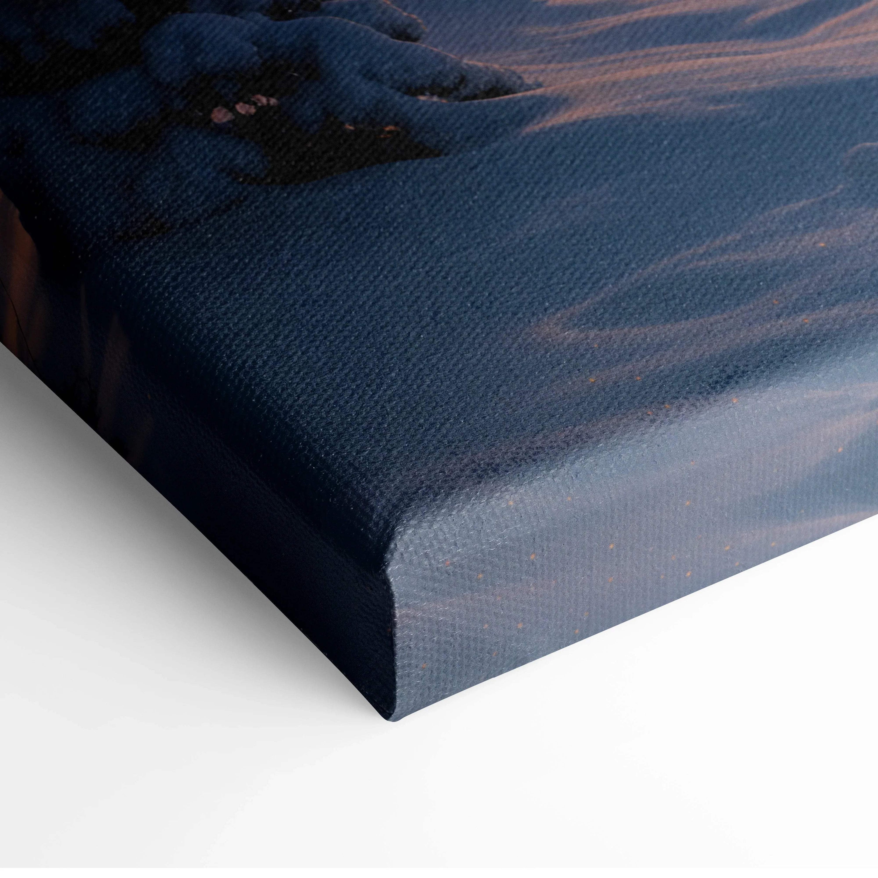 Dark blue textured canvas print of dreamlike winter village at dusk