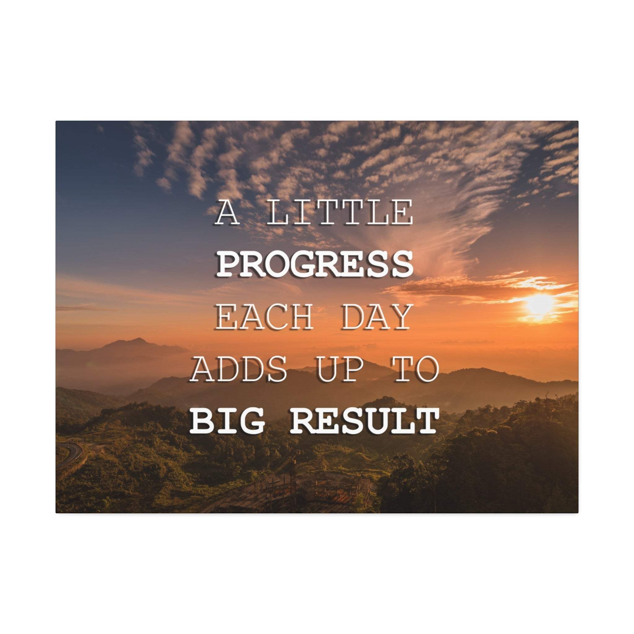 Motivational mountain sunrise canvas wall art with a little progress each day quote in white on orange gold landscape