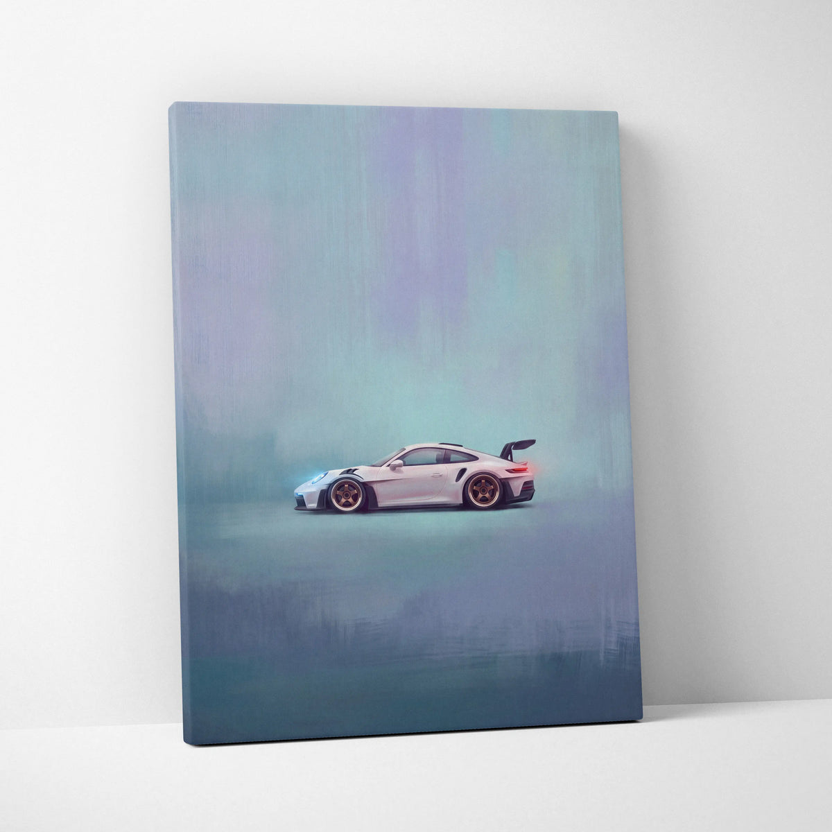 A sleek white porsche 911 gt3 rs canvas print with gold rims and rear spoiler for luxury automotive wall art