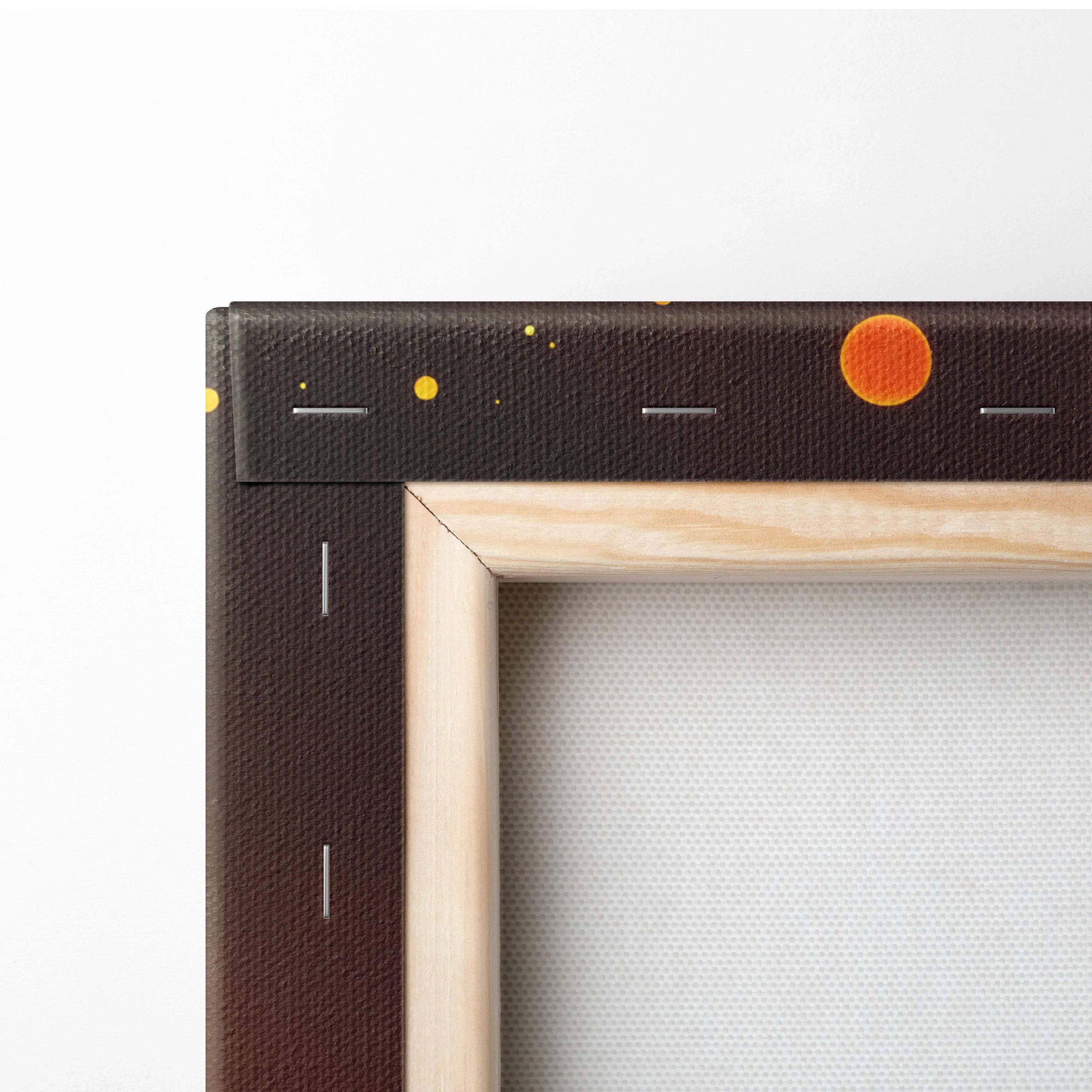 A dark brown canvas painting with a wooden frame, featuring an orange circular design and small yellow dots on the border.