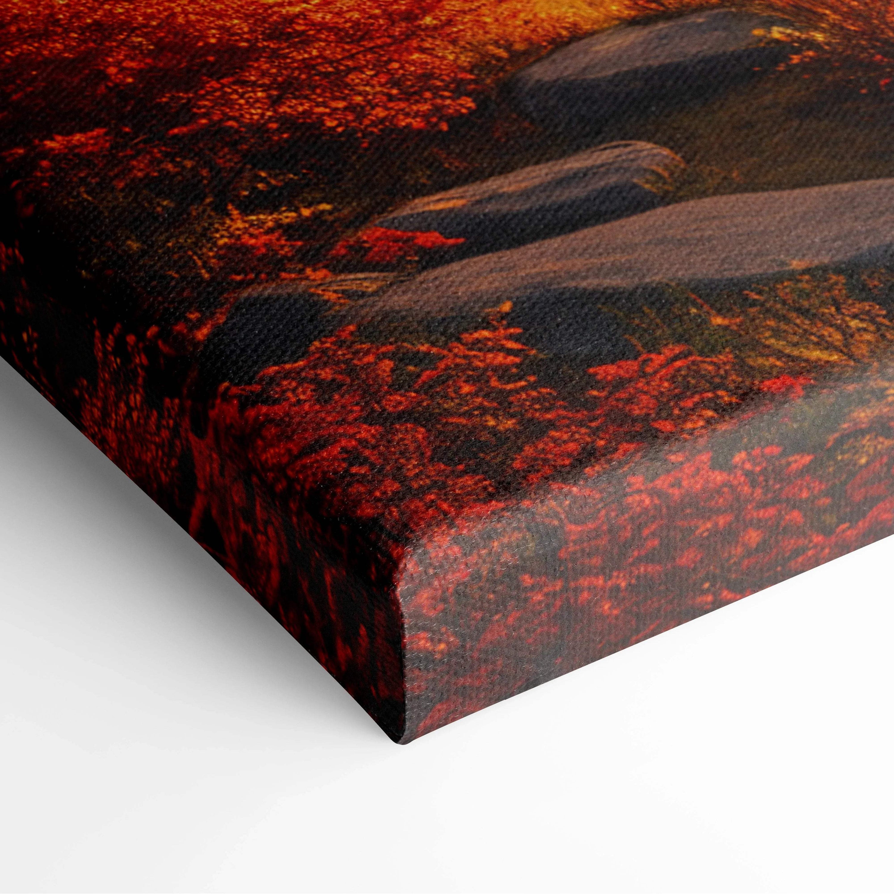 Cozy log cabin by golden sunset lake amid fiery autumn trees canvas print