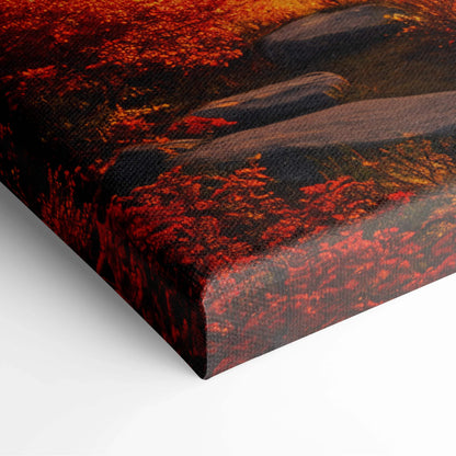 Cozy log cabin by golden sunset lake amid fiery autumn trees canvas print
