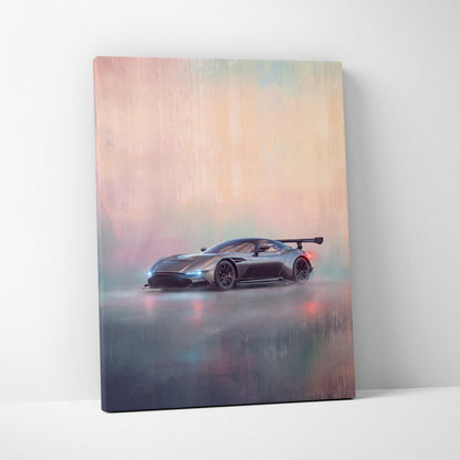 A sleek matte black aston martin vantage race car with glowing blue headlights on a misty pastel wall art canvas