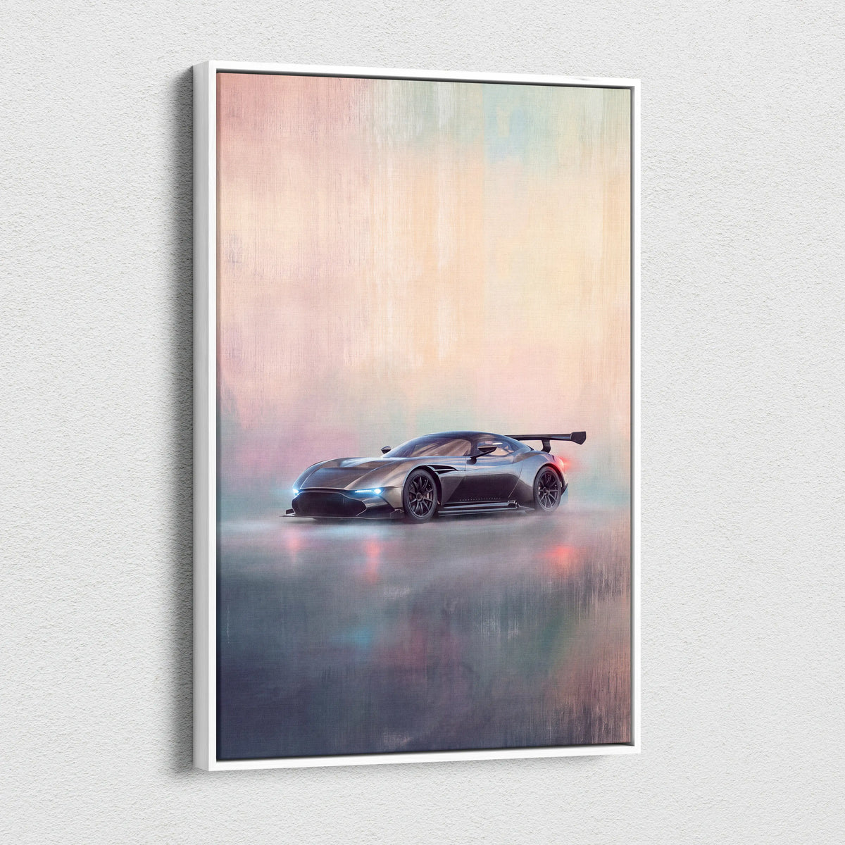 Aston Martin Valkyrie inspired supercar canvas art featuring a sleek matte black Aston Martin Vantage race car with glowing lights