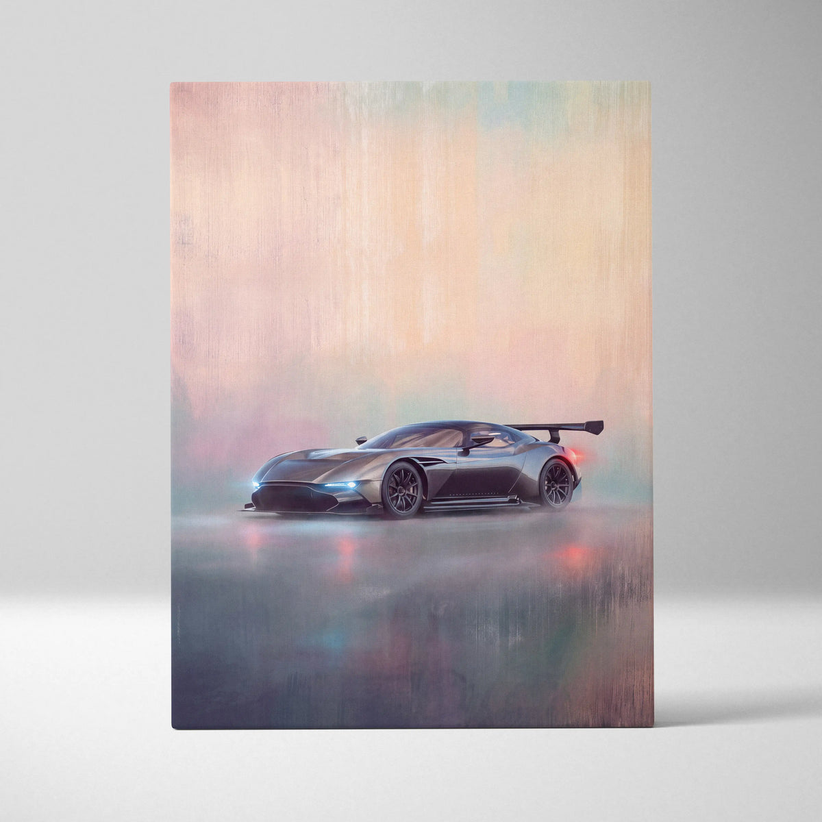 A sleek matte black aston martin valkyrie inspired supercar canvas art print with glowing blue headlights and rear wing