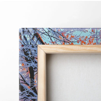 Light wood-framed canvas of autumn leaves in orange purple on teal sky