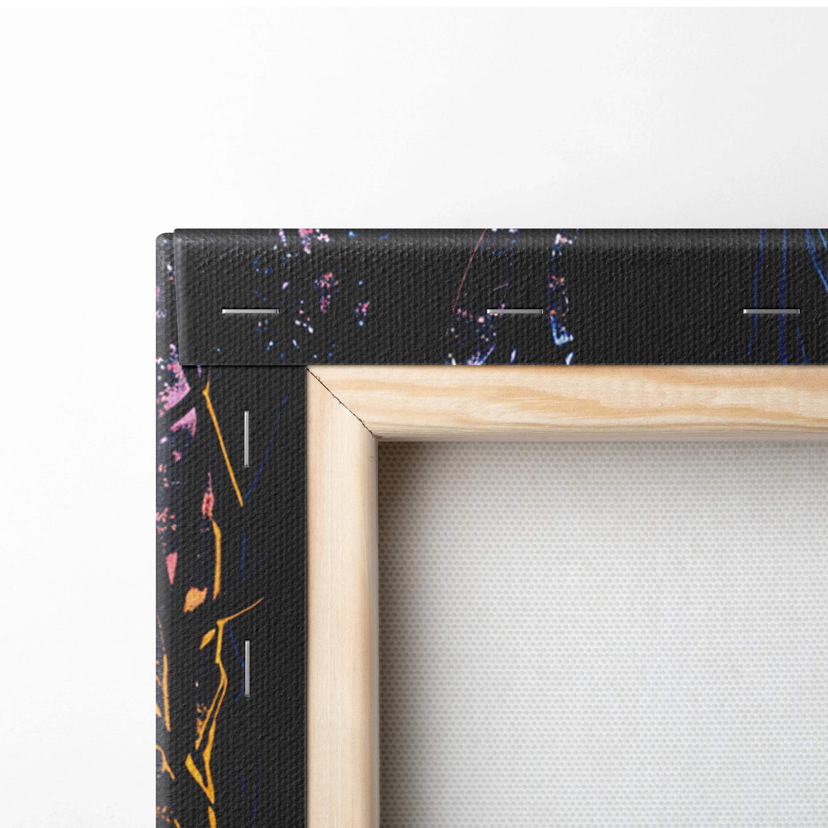 Glowing sunset through forests path with vibrant pink yellow blue splatters on black canvas in light wood frame