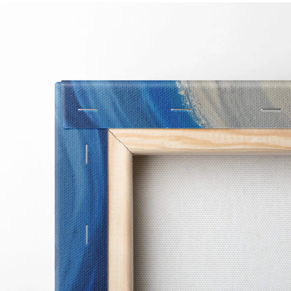 Blue canvas art of crescent moon drifting through swirling night currents with stars in wooden frame