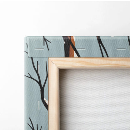 Light wood-framed canvas print of rustic winter cabin in snowy forest with minimalist black trees on teal background