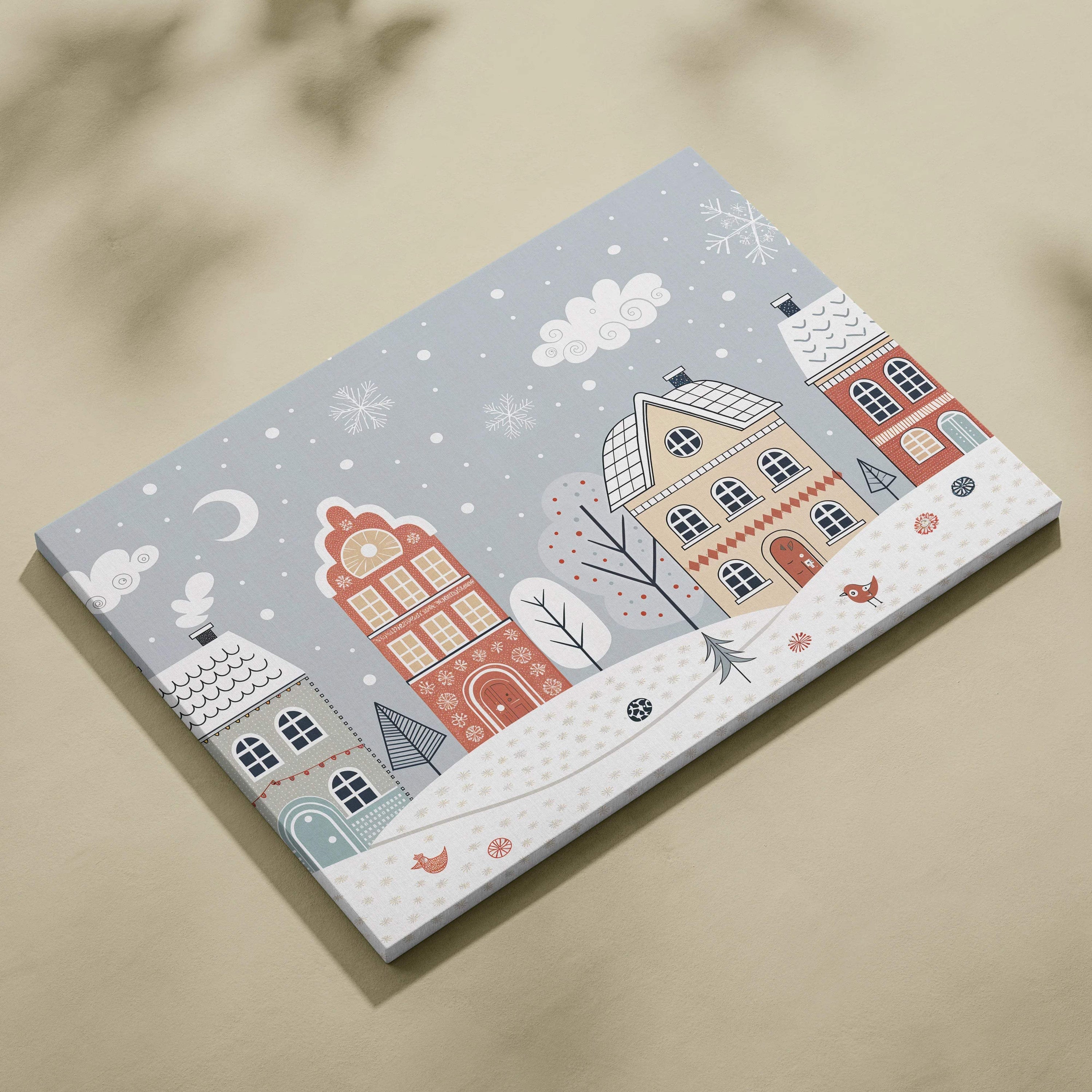 Whimsical winter village canvas wall art in soft pastel blues and warm beige tones