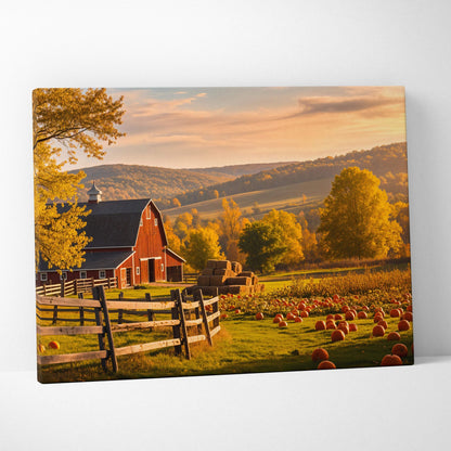 Rustic red barn in golden autumn light with pumpkins and hay bales