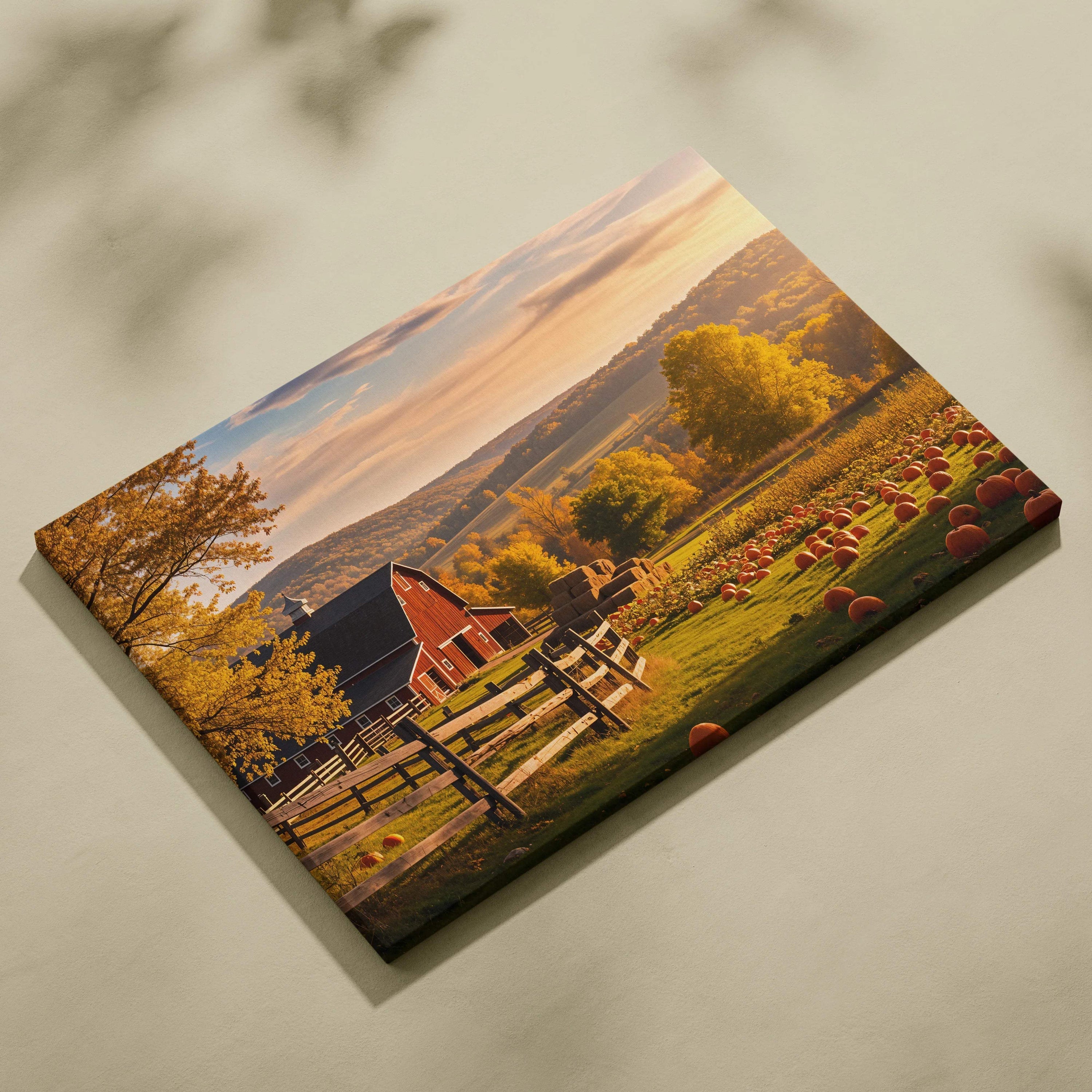 Rustic red barn in golden autumn light with pumpkins and hay bales canvas art
