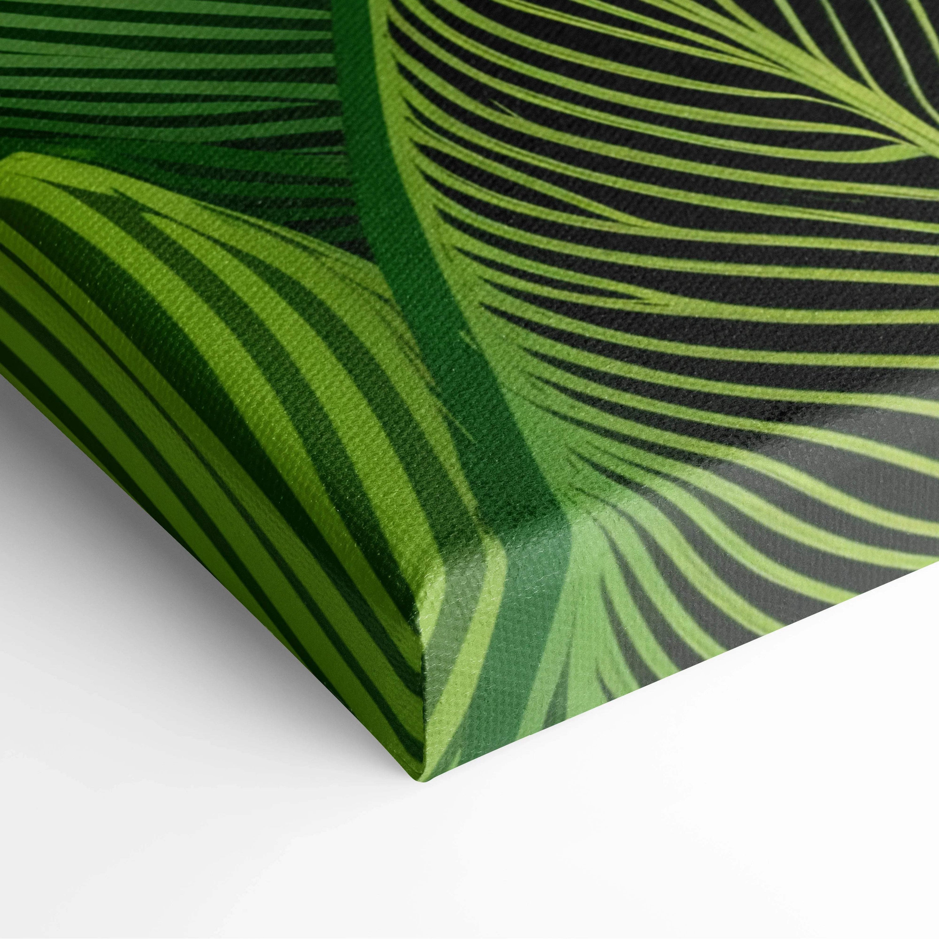 Bold stylized palm fronds in lime and forest green on black canvas art