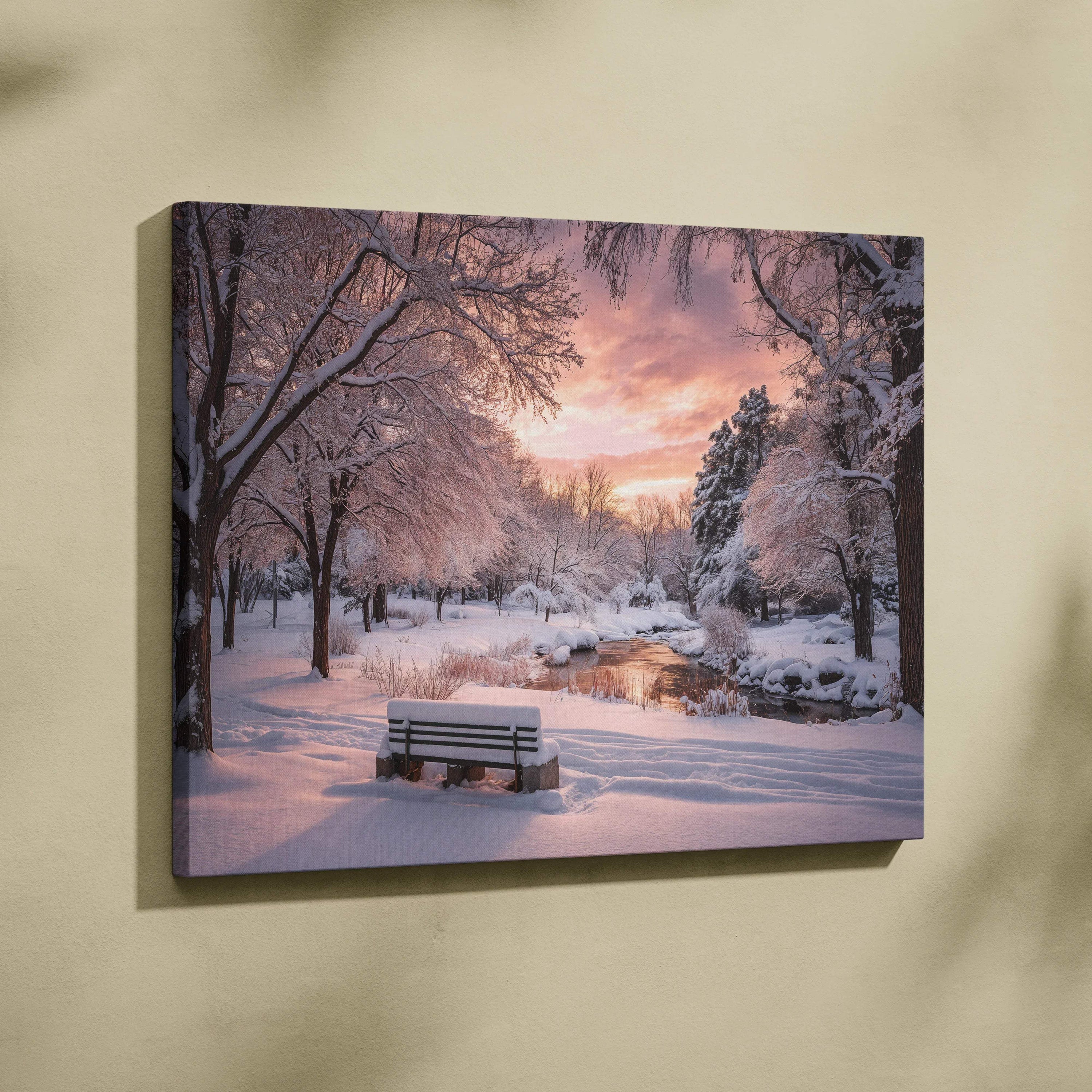 Snowy park bench at dusk with sunset light canvas print