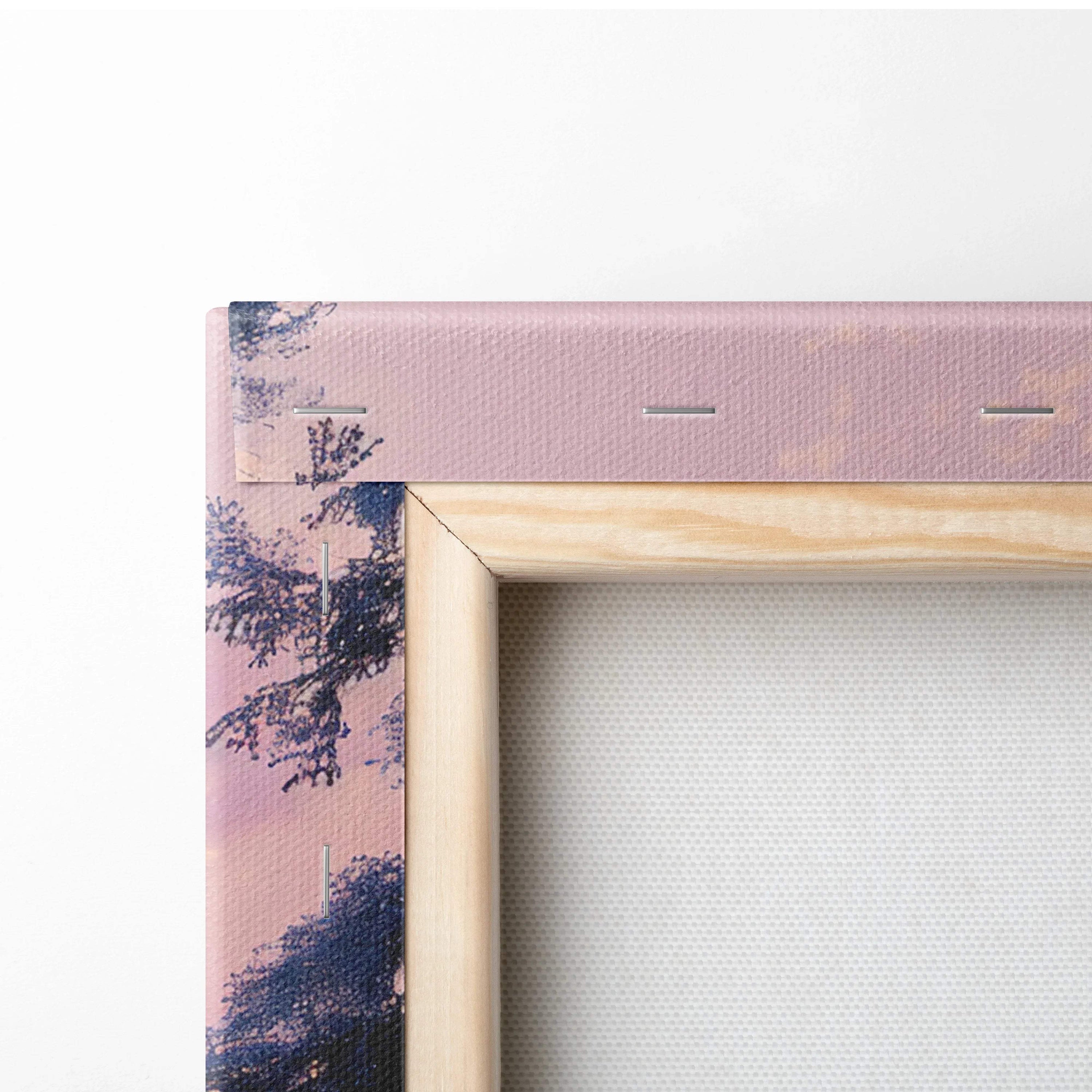 Minimalist wooden frame with cinematic winter landscape canvas in soft pinks