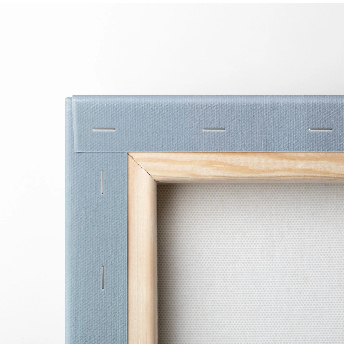 Light blue textured canvas frame with natural wood inner border featuring ferrari 296 gt3 inspired track edition car art