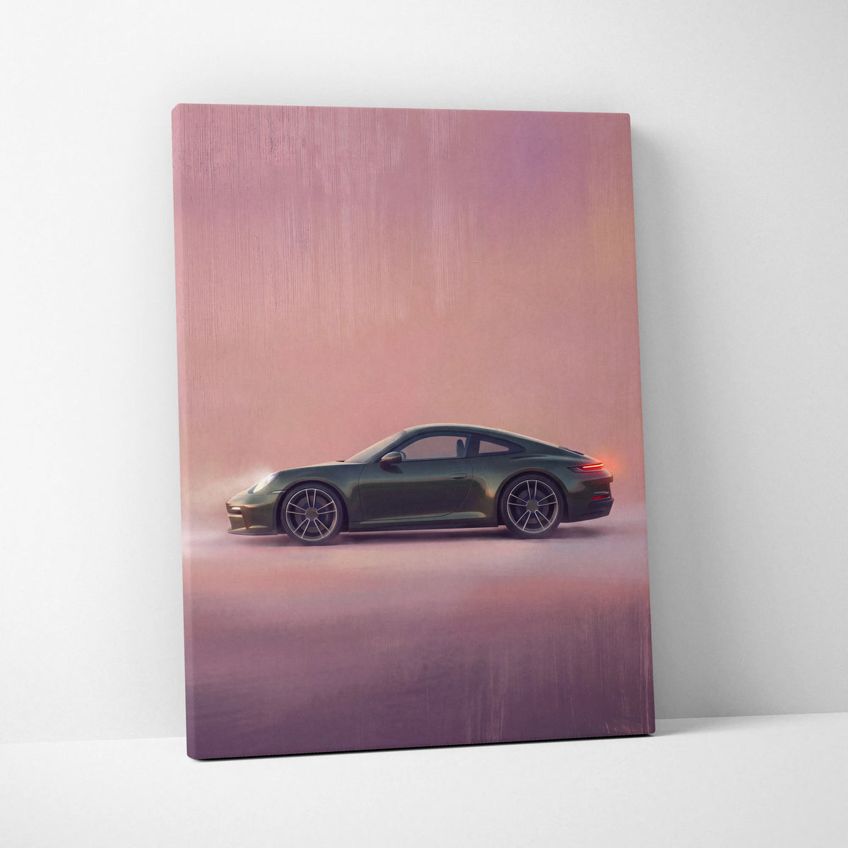 A canvas print of a dark green Porsche 911 sports car in profile on a soft pink and purple gradient background