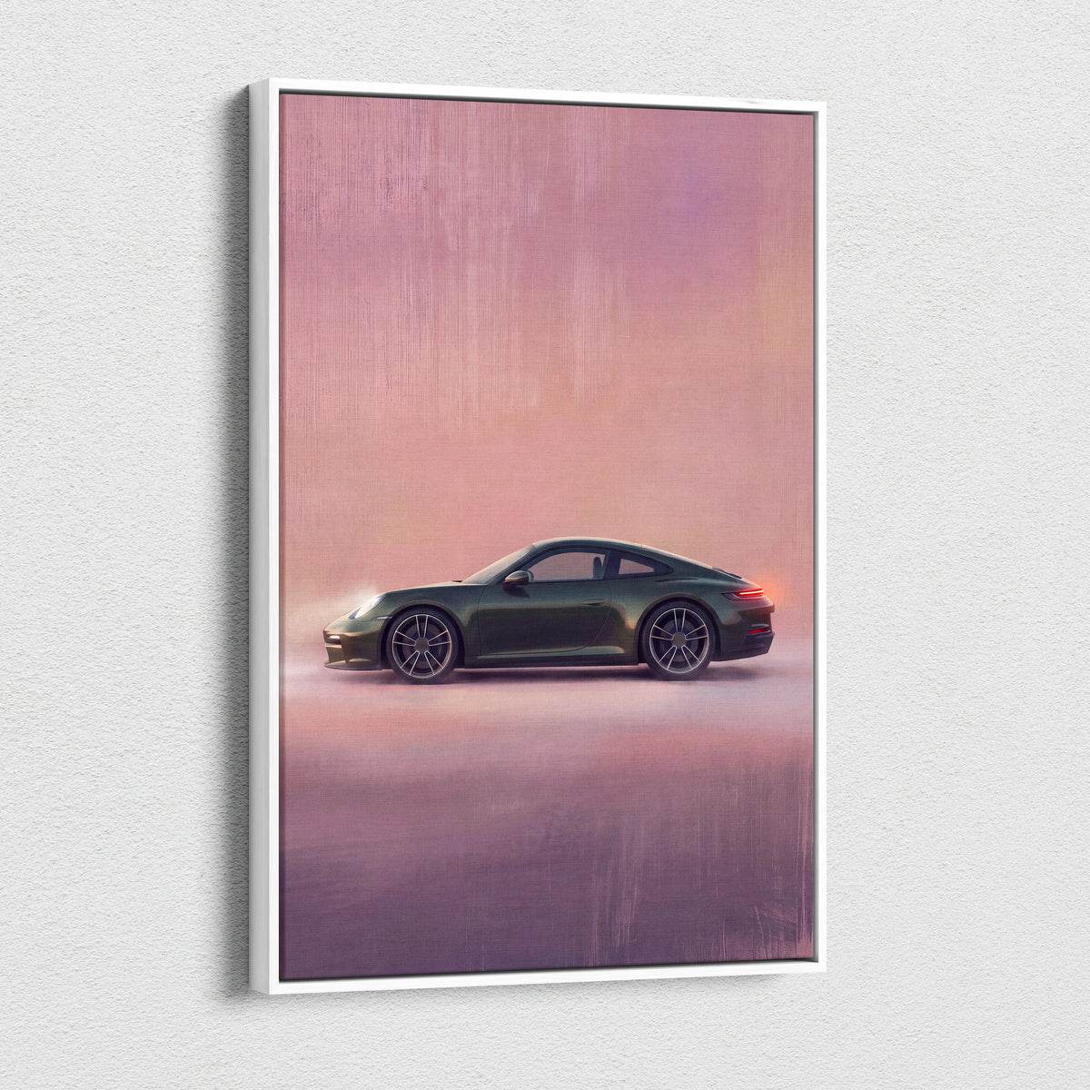 A framed canvas print featuring a dark green porsche 911 sports car against a pink and purple gradient sky