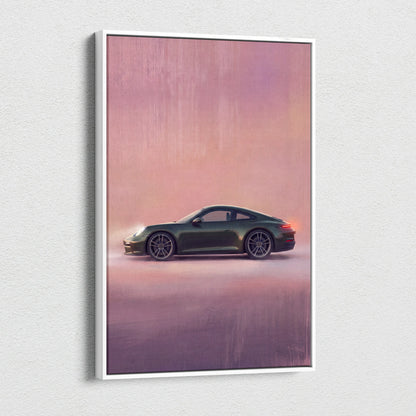 A framed canvas print featuring a dark green porsche 911 sports car against a pink and purple gradient sky