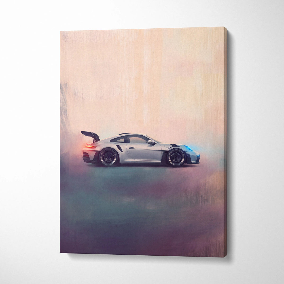 Silver Porsche 911 GT3 RS canvas print featuring sleek aerodynamic design with black racing stripes and blue orange accents