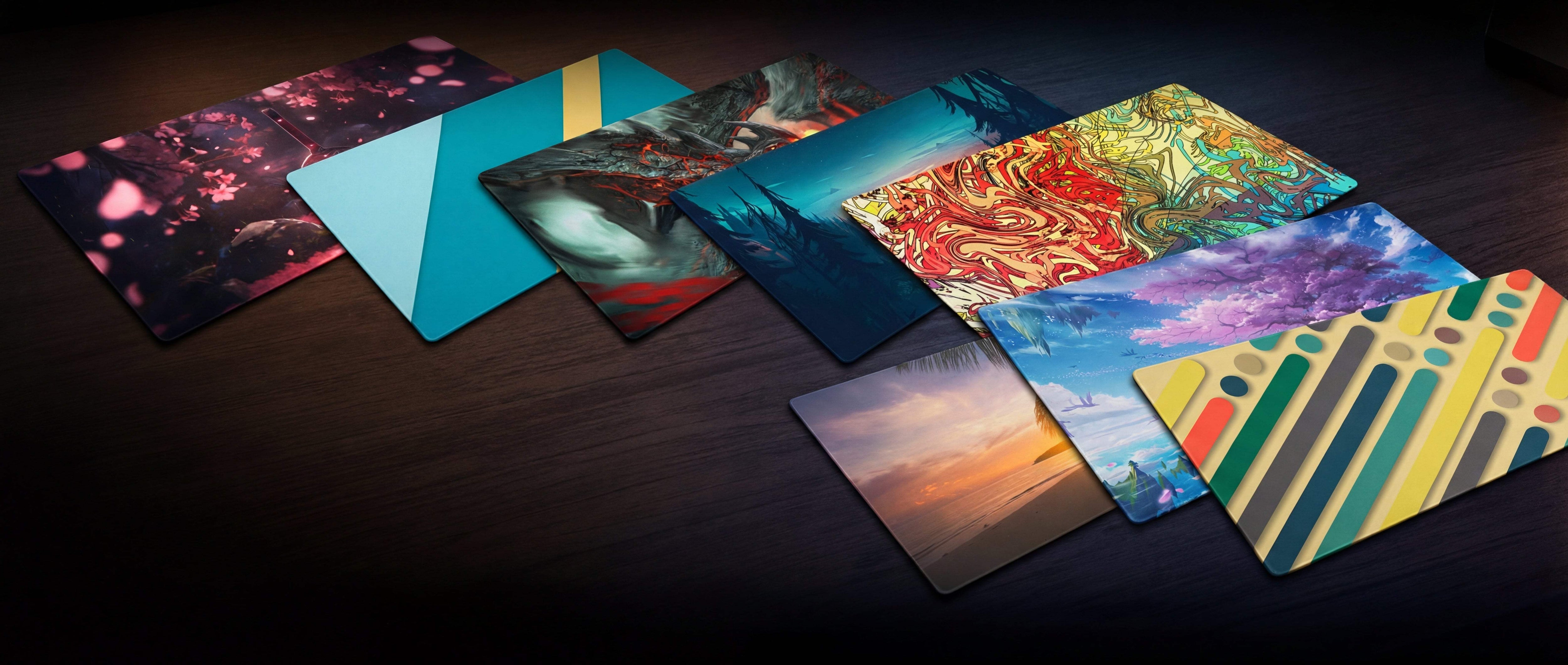 A collection of colorful, rectangular card-style wallets with vibrant, artistic designs featuring abstract patterns and nature scenes.