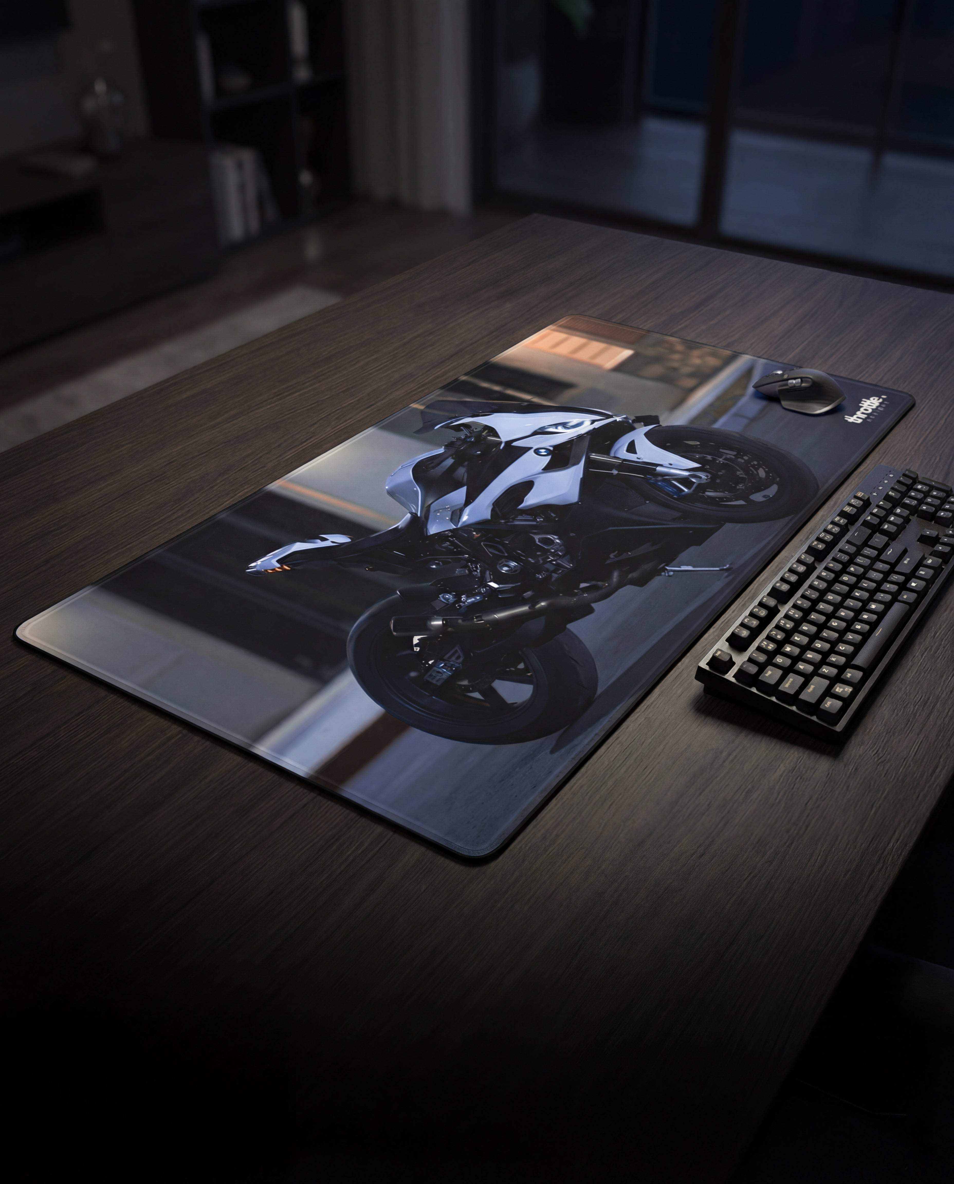 Black and white motorcycle graphic printed on a sleek, rectangular gaming mousepad.