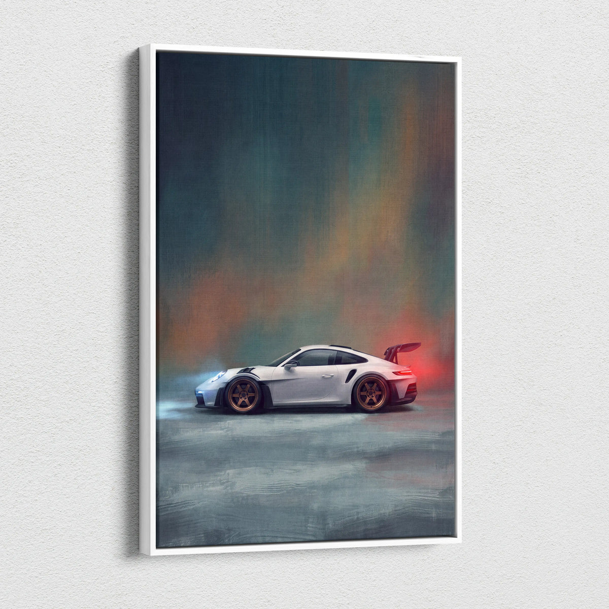 White framed canvas print of a white porsche 911 gt3 rs sports car with gold rims drifting on a moody gradient background