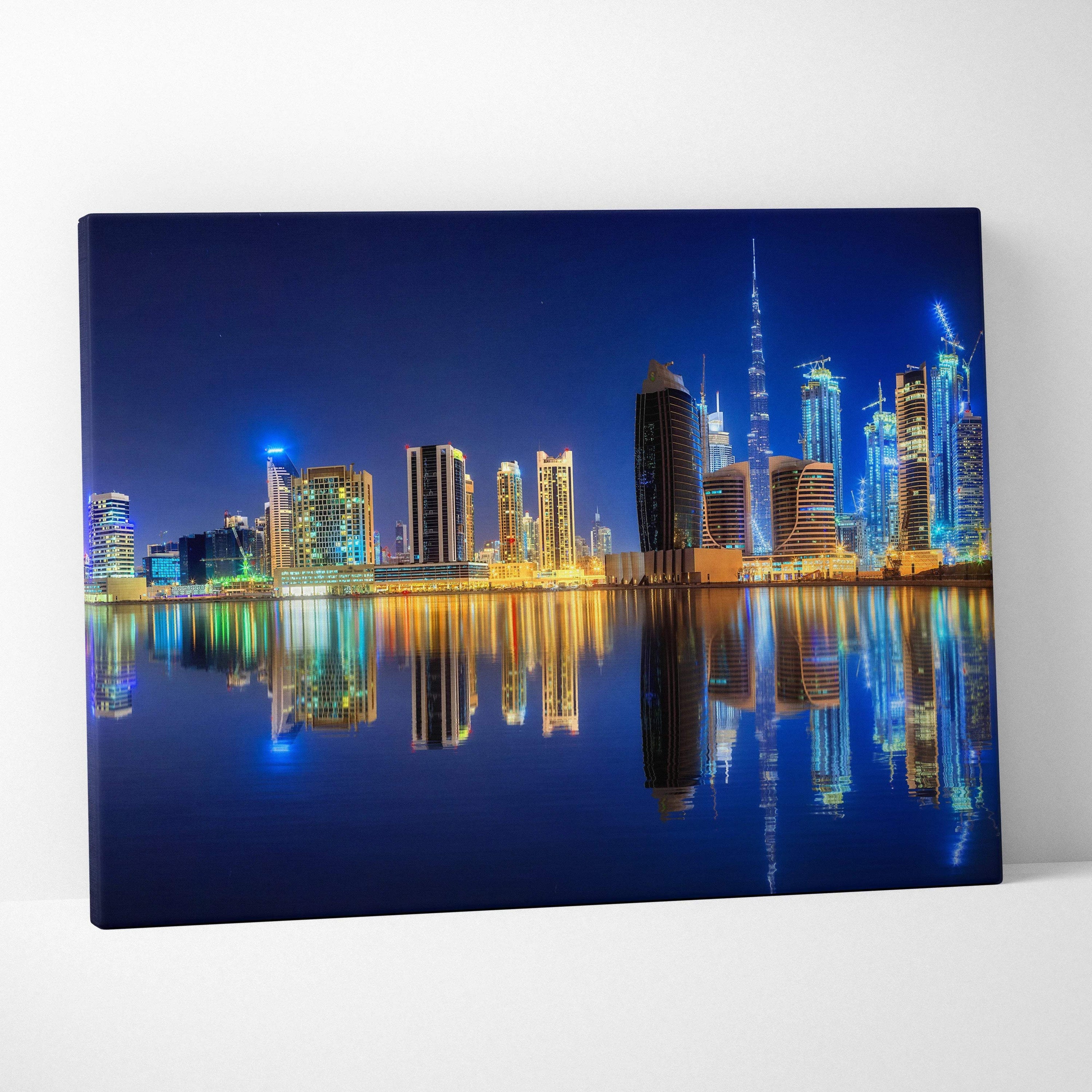 Dubai night skyline canvas art with Burj Khalifa reflections in blue gold neon