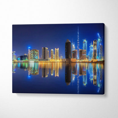 Dubai night skyline canvas art with Burj Khalifa reflections in blue gold neon