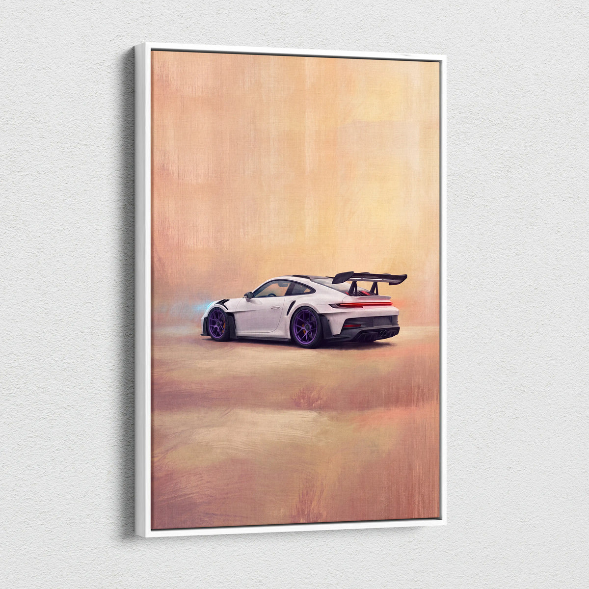 White framed canvas print of a white porsche 911 gt3 rs with black accents and purple wheels on an orange background