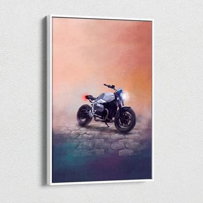A framed canvas print of a matte black and silver BMW R nineT inspired motorcycle with glowing headlights and gradient sky