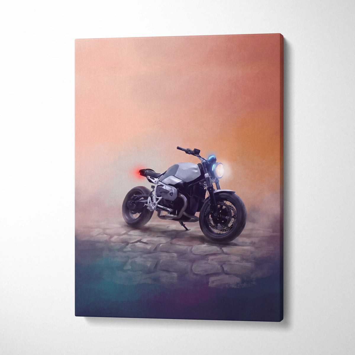 A sleek silver and black BMW R nineT inspired naked motorcycle canvas print with glowing lights against orange-purple sky