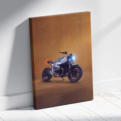 Canvas print of a sleek silver and black BMW r nineT motorcycle with glowing headlights on a warm brown backdrop