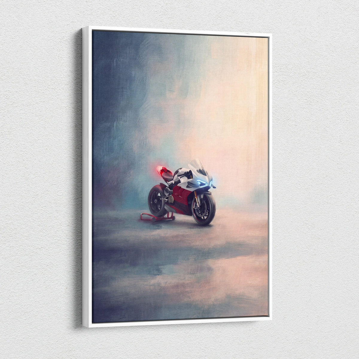 A framed canvas print of a red and white Ducati Panigale V4 with glowing blue headlights on a misty track backdrop