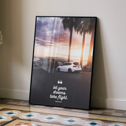Motivational poster wall art with white Subaru WRX STI at sunset and inspiring text on black background.