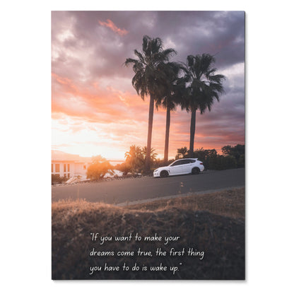 Motivational poster wall art featuring a white Subaru WRX STI parked by palm trees at sunset with inspiring text.