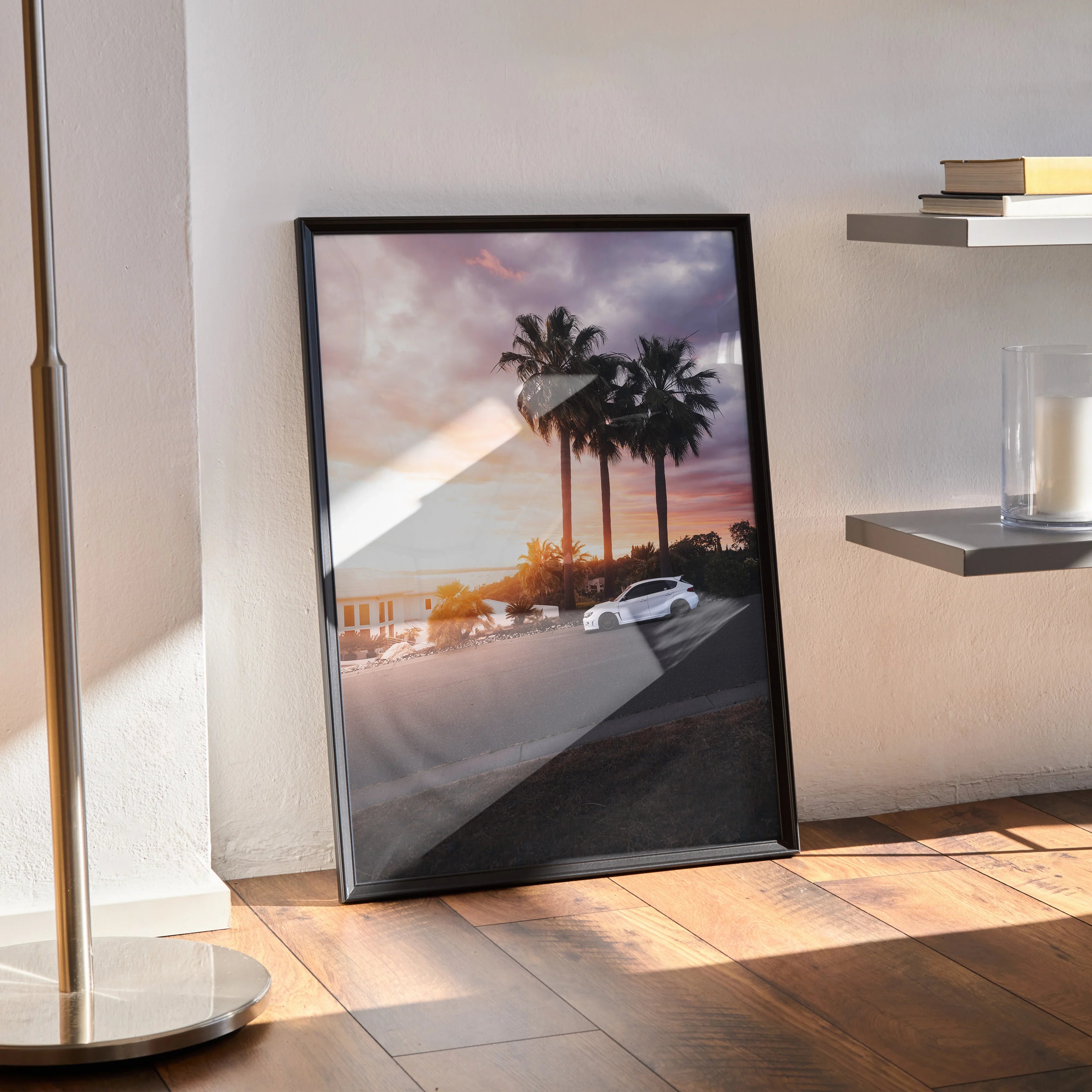 Subaru WRX STI poster with sunset and palm trees, automotive wall art in black frame.
