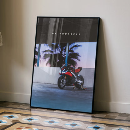 Motivational poster wall art featuring Aprilia RSV4 1100 Factory motorcycle against sunset backdrop.