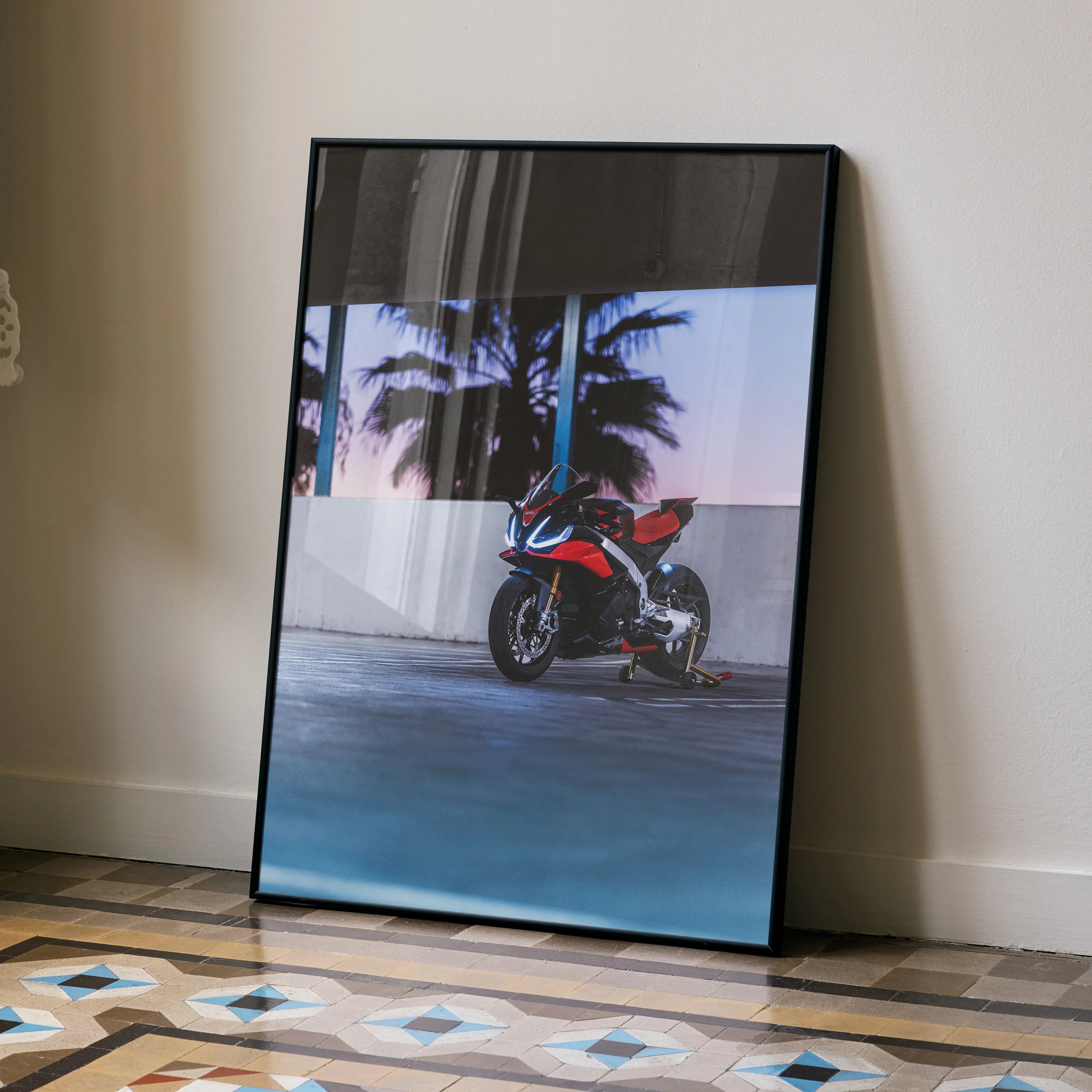 Aprilia RSV4 1100 Factory motorcycle poster with red and black bike under palm trees wall art.