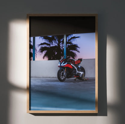 Aprilia RSV4 1100 Factory motorcycle poster with palm trees at sunset, modern wall art in wooden frame.